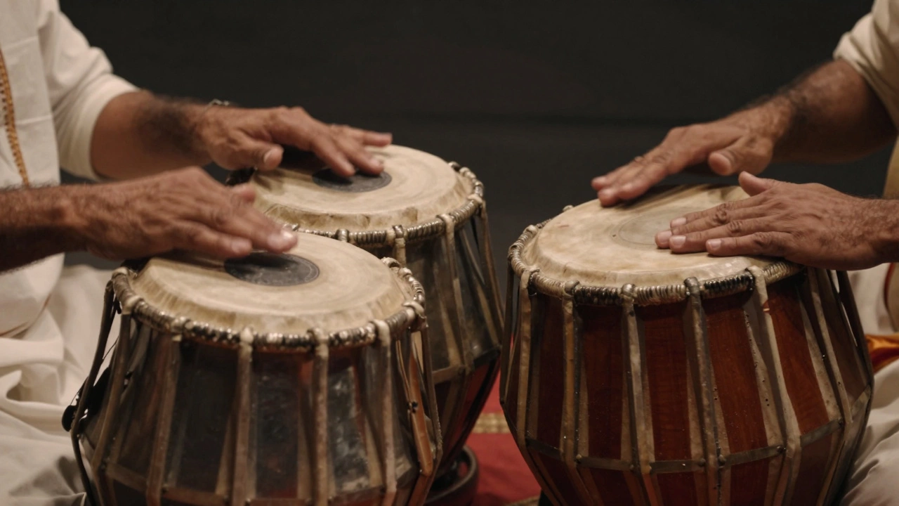 Close-up of hands playing Tabla and Mridangam drums highlighting rhythmic techniques